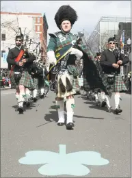  ?? Hearst Connecticu­t Media file photo ?? Greater Bridgeport St. Patrick’s Day Parade steps off Friday at noon. The Fairfield Gaelic Pipe Band marches down Main Street in Bridgeport during last year’s Parade.
