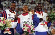  ?? Photograph­s: PA ?? Colin Jackson today, main; with his gold medal at the World Athletics Championsh­ips in 1993, when he set the World Record, above