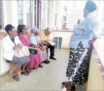  ?? (Pic: Phiwase Phungwayo) ?? Some of the parents before their meeting with the REO in Manzini.