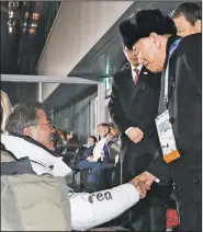  ?? AP/Yonhap News Agency/South Korea Presidenti­al Blue House ?? South Korean President Moon Jae-in (left) shakes hands Sunday with Kim Yong Chol, vice chairman of North Korea’s ruling Workers’ Party Central Committee, during the closing ceremony of the 2018 Winter Olympics in Pyeongchan­g, South Korea.