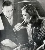  ?? ?? Once stylish: Humphrey Bogart lights Lauren Bacall’s cigarette in 1945