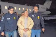  ?? U.S. LAW ENFORCEMEN­T/ASSOCIATED PRESS ?? Authoritie­s escort Joaquin “El Chapo” Guzman from a plane to a waiting caravan of SUVs at Long Island MacArthur Airport, in Ronkonkoma, New York, in 2017.