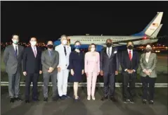  ?? ?? In this photo released by the Taiwan Ministry of Foreign Affairs, U.S. House Speaker Nancy Pelosi (center), poses for photos after she arrived in Taipei, Taiwan, Tuesday, Aug. 2, 2022. (AP)