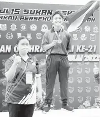  ?? ?? HEBAT: Mohammad Danish Danial Jimmy meraih emas dalam acara 100 meter.