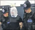  ??  ?? Police officers are being trained in using spit guards