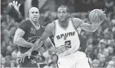  ?? KEN BLAZE, USA TODAY SPORTS ?? Spurs forward Kawhi Leonard scored a career- high 41 points on 15- for- 30 shooting in an overtime victory against the Cavaliers in Cleveland on Saturday.