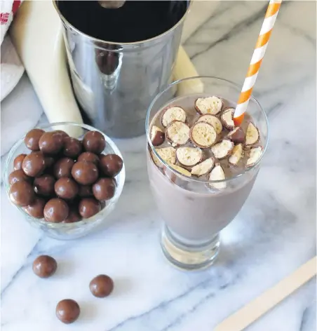  ??  ?? This malted milkshake is flavoured with Ovaltine and can be topped with chopped malted-milk balls.