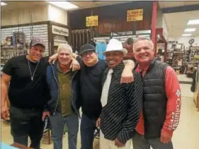  ??  ?? Tony Gilmore (second from right) and part of the gang of merry vendors at Big E’s in Bordentown. (From left: Nicky Sindora, Ron Horowitz, Larry Sindora, Gilmore, Martin Mainzer)
