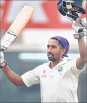  ??  ?? Wriddhiman celebrates his century during 3rd test match against Australia in Ranchi on Sunday.