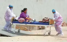  ?? AP ?? A patient being shifted to another hospital to vacate the bed for new patients at Civil hospital in Ahmedabad, yesterday.