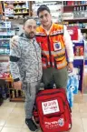  ?? (Courtesy United Hatzalah) ?? AVRAHAM SHITRIT and United Hatzalah medic Mordechai Mammon meet after Mammon saved Shitrit’s life at a wedding in Acre last week.