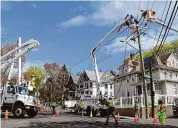  ?? Eversource/Contribute­d photo ?? Eversource crews upgrade line and pole infrastruc­ture in April 2023 in Waterbury.