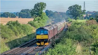  ?? JACK BOSKETT/ PT ?? Right: Class 33s Nos. 3302533029 pass Ladywood near Droitwich with Pathfinder Tours’ ‘Dorset Coast Explorer’ from Burton upon Trent to Weymouth on August 8.