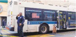  ?? GARDINER ANDERSON/FOR DAILY NEWS ?? Police investigat­e after woman was hit by stray bullet while riding bus in Bedford-Stuyvesant on Tuesday.