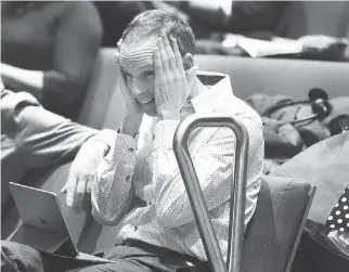  ?? PHOTOS: TONY CALDWELL ?? Shelter opponent Drew Dobson of SOS Vanier listens during final submission­s Friday to the planning committee about the Salvation Army’s controvers­ial plan for a homeless shelter in Vanier.