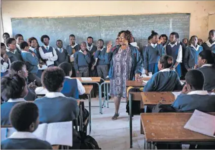  ?? Photo by: Per-anders Pettersson/getty Images ?? Back to basics: Ndevana High School in rural Eastern Cape, like many schools, particular­ly in rural South Africa, has inadequate facilities.