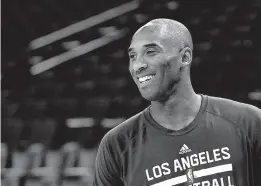  ?? Associated Press ?? Los Angeles Lakers guard Kobe Bryant warms up before a game against the Golden State Warriors on Tuesday in Oakland, Calif.