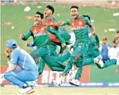  ?? — ICC ?? Jubilant Bangladesh players celebrate wildly after beating India in the final of the U-19 World Cup in South Africa on Sunday.