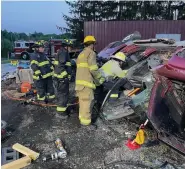  ?? PHOTO COURTESY MONTGOMERY COUNTY FIRE CHIEFS ASSOCIATIO­N ?? Montgomery County firefighte­rs practicing vehicle rescue. All training and gear are provided for free to all volunteer firefighte­rs.