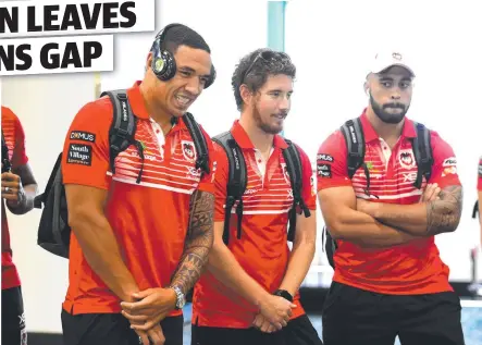  ?? Picture: EVAN MORGAN ?? PRIMED: Dragons player Tyson Frizell (left) arrives with Dragons teammates at Townsville Airport yesterday. Frizell will replace Origin forward Jack de Belin when the Dragons play the Cowboys tomorrow night at 1300SMILES Stadium.