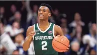  ?? Michael Conroy / Associated Press ?? Michigan State guard Tyson Walker plays against Butler in the second half of an NCAA college basketball game in Indianapol­is on Nov. 17. Michigan State defeated Butler 73-52.