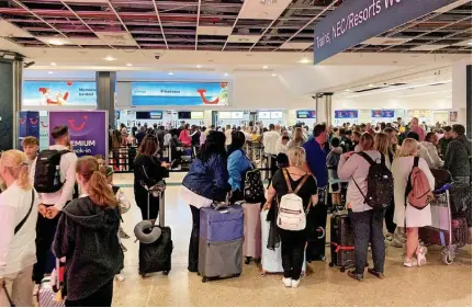  ?? ?? Birmingham Airport passengers have been hit by massive queues amid ongoing building works