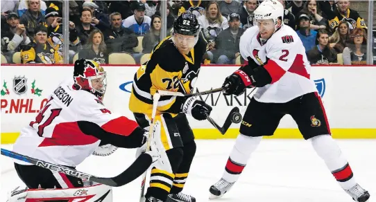  ?? GENE J. PUSKAR/THE ASSOCIATED PRESS ?? Craig Anderson, left, Dion Phaneuf and the rest of the Senators got a chance to rest up ahead of tonight’s game with Patric Hornqvist’s Penguins.