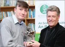  ??  ?? Guest of honour Liam O’ Connor presenting the Senior Hurling award to Sean Meehan.