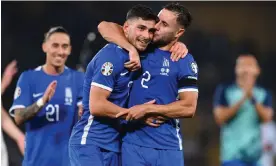  ?? Photograph: Seb Daly/Sportsfile/Getty Images ?? Greece’s match-winner, Giorgos Masouras, left, and George Baldock celebrate victory over the Republic of Ireland.