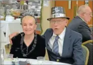  ??  ?? Ceil Morton and Gus Carlson enjoy the New Year’s Eve festivitie­s at the Pennridge Community Center.