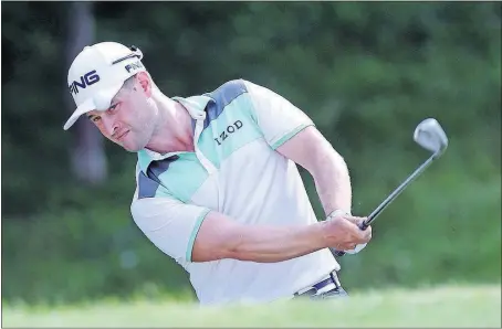  ?? [GEOFF BURKE / [USA TODAY SPORTS] ?? David Lingmerth chips to the ninth green during the first round of the Quicken Loans National golf tournament at TPC Potomac at Avenel Farm.
FRENCH OPEN: