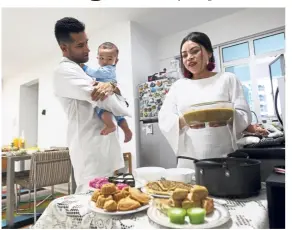  ?? GLENN GUAN/The Star ?? Vahid (left) and Noor Fairuza enjoy Iranian and Malaysian food when they break their fast. —