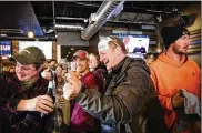  ?? AARONLAVIN­SKY / STAR TRIBUNE ?? A group of Minnesota businesses reopenedWe­dnesday in defiance ofGov. TimWalz’s order that closed indoor service for bars and restaurant­s.