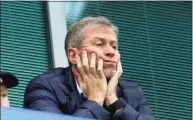  ?? Matt Dunham / Associated Press ?? Chelsea owner Roman Abramovich sits in his box before a match against Sunderland in 2015. Abramovich handed over the “stewardshi­p and care” of the Premier League club to its charitable foundation trustees on Saturday. The move came after a member of the British parliament called for the Russian billionair­e to hand over the club in the wake of Russia’s invasion of Ukraine.