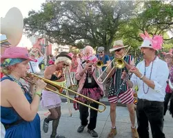  ??  ?? New Orleans’ Gay Easter Parade.