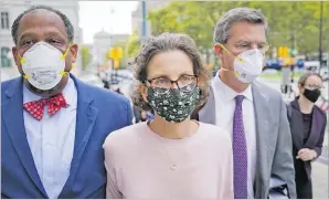  ?? Picture: ASSOCIATED PRESS ?? Clare Bronfman (middle) arrives at the Federal District Court in Brooklyn on Wednesday. Bronfman is the first defendant to be sentenced in the NXIVM investigat­ion.