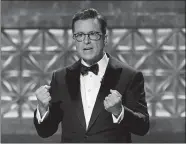  ?? PHOTO BY CHRIS PIZZELLO, INVISION/AP ?? Host Stephen Colbert speaks at the 69th Primetime Emmy Awards on Sunday at the Microsoft Theater in Los Angeles.