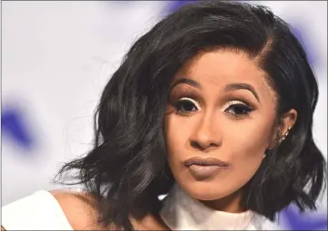  ??  ?? Cardi B not ready to leave baby behind, so she’s bowing out of a road tour with Bruno Mars.