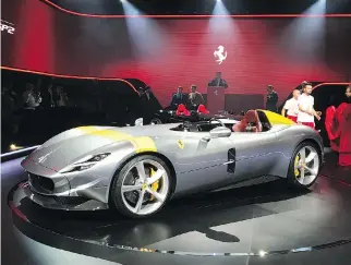  ?? COLLEN BARRY/AP ?? Ferrari plans to launch an unpreceden­ted 15 new models, including the Ferrari Monza SP1, which the company bills as its most powerful road car ever with revved-up Formula One technology.