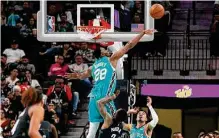  ?? Ronald Cortes/contributo­r ?? Backup center Charles Bassey matched a career high with four blocked shots in Thursday’s victory over the Rockets.