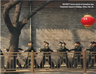  ??  ?? SECURITY forces march in formation near Tiananmen Square in Beijing, China, Feb. 26.