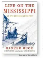  ?? Courtesy of the publisher ?? Above, Rinker Buck’s flatboat Patience chugs down the Mississipp­i.