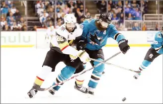  ?? (AFP) ?? Alex Tuch #89 of the Vegas Golden Knights and Brent Burns #88 of the San Jose Sharks go for the puck during Game Three of the Western Conference Second Round during the 2018 NHL Stanley Cup Playoff at SAP Center
on April 30, in San Jose, California.
