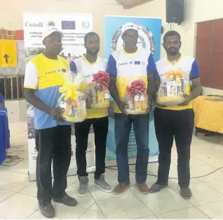  ??  ?? The all-male team from Top Alston share a photo after placing second in the Upper Clarendon Farmers Climate Change Quiz competitio­n.