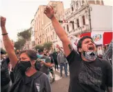  ?? RODRIGO ABD THE ASSOCIATED PRESS ?? Supporters of ousted President Martin Vizcarra chant the national anthem near congress in Lima.