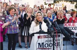  ?? BRYNN ANDERSON/THE ASSOCIATED PRESS ?? Kayla Moore, wife of U.S. Senate candidate Roy Moore, speaks at a news conference Friday in Montgomery, Ala. Moore spoke out in defense of her husband, saying they have been married for over 32 years and the Army veteran has always been an officer and...