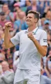  ?? AP PHOTO/KIRSTY WIGGLESWOR­TH ?? Poland’s Hubert Hurkacz celebrates after defeating Switzerlan­d’s Roger Federer during Wimbledon’s men’s singles quarterfin­als match on Wednesday.