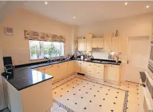  ?? ?? Spacious The kitchen lies open-plan to a family room