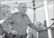  ?? Elias Valverde II/THE Dallas Morning NEWS/TNS ?? Texas Department of Public Safety Director Steve Mccraw listens to a question from a reporter during a press conference outside Robb Elementary School in Uvalde, Texas, on May 27.