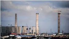  ?? ?? KUSILE power plant in the east of Johannesbu­rg. The constructi­on of Medupi and Kusile coal plants have proved technologi­cally flawed, way over budget and badly behind schedule, the writer says. | African News Agency (ANA) archives